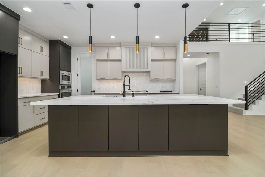 PRE-SELLING this already custom-designed home you can put your own personal touches on! Nestled in one of the most sought-after areas in NWA i.e Bentonville offers prime location and convenience! Introducing an exquisite custom-built future home within proximity to shopping, Trails, quick access to Downtown square and entertainment. This stunning home features 12-14' ft ceilings and luxurious finishes throughout. The gourmet kitchen boasts high-end appliances and walk-in pantry, perfect for the home chef. Enjoy outdoor living under a covered porch, ideal for entertaining. This home offers both elegance and beautiful views with trees combining modern design and comfort. Don't miss out on a chance to make this home yours, with your own custom touches! Call today!