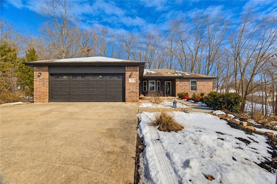 Enjoy a serene, nature-filled setting near the Metfield clubhouse with pool, pickleball courts and golf course in this 3-bedroom, 2.5-bath home. The open floor plan keeps everyone connected and is perfect for entertaining, while skylights fill the home with beautiful natural light. Designed for an active Northwest Arkansas lifestyle, this home blends privacy and flexibility with access to trails. A finished 480 sq ft heated/cooled basement with its own exterior entrance and walkable storage area offers exceptional versatility—ideal for a gym, office, media room, or easily updated into a private guest suite. Relax on the screened-in porch—perfect for morning coffee or evening unwinding—and enjoy an oversized 2-car garage with room for bikes and projects. The neighborhood offers access to the Back 40 trail system and the Greenway. Additional features include city sewer, plus you’re just a 10-minute drive to Walmart Supercenter and 3.3 miles (15-minute ride) to the OZ Trails Bike Park, opening Summer 2026.
