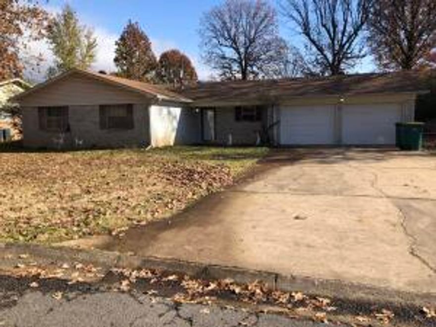 FIXER UPPER.... is this 3 Bdr, 2 bth, fireplace, fenced yard.  Selling ''As-Is''