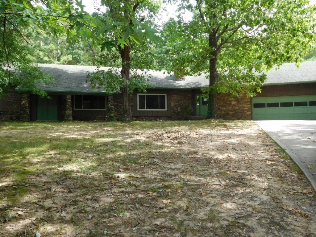 Expansive, ranch style home on nearly 2 acres, entertainment area with wet bar, extra rooms off the garage with full bath, 2 living areas. SOLD AS-IS, NO REPAIRS WILL BE DONE TO FACILITATE INSPECTIONS. **Property was built prior to 1978 and lead based paint potentially exists.**