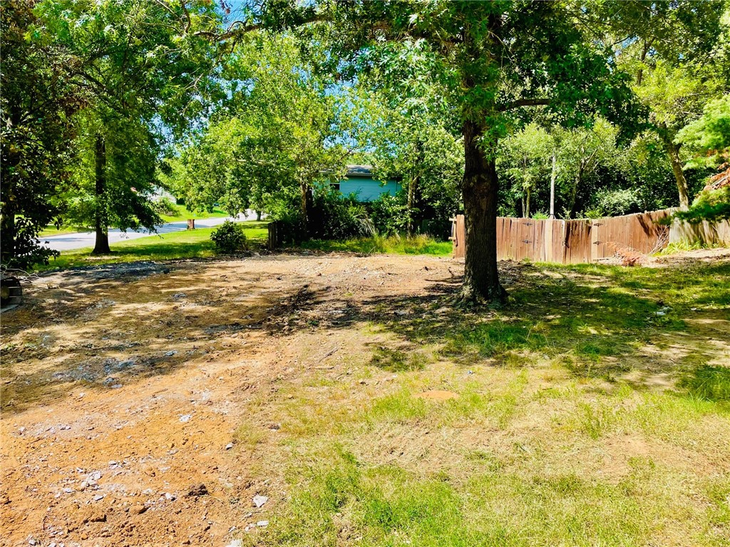 RARE opportunity to build in est. neighborhood with mature trees on large corner lot in east Fayetteville. One block from Old Wire bike trail and a couple blocks from the popular Gulley Park.