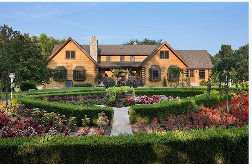 This stunning private estate, showcased in numerous magazines as the pinnacle of luxury log home living, seamlessly blends European elegance with rustic charm. Nestled behind a gated entry and surrounded by lush botanical gardens, this nearly 10-acre property is a retreat like no other. The 7,000 sq. ft. main home offers 5 bedrooms and 3.5 baths, while the 4,500 sq. ft. “barn” welcomes guests with sleeping space for 18 and 2.5 baths. Whether enjoying the 9’ saltwater pool, fishing the 2-acre stocked pond, or hosting gatherings in the custom-designed barn, this estate is ideal for creating memories—or transforming into a bed and breakfast or event destination.  A 2.5-acre, well-fed pond stocked with catfish, bluegill, and bass enhances the property’s charm, while an 860 sq. ft. dog kennel with water and a dedicated run make it ideal for pet enthusiasts. This extraordinary one-owner estate is a must see. Ten acres of the larger parcel are included in the sale, and prequalification is required before showings.