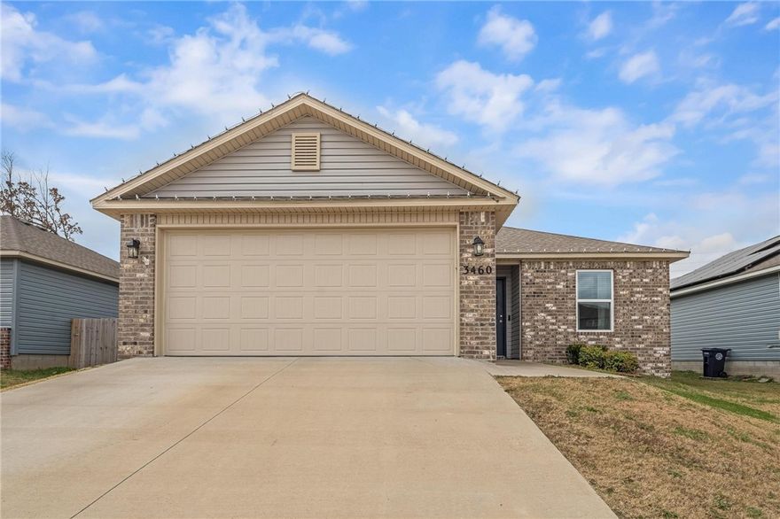 Perfectly situated between Prairie Grove and Farmington, this inviting home offers great curb appeal with a covered front entry and well-maintained landscaping. Inside, the open floor plan features 3 bedrooms, 2 bathrooms, and a spacious primary suite. The kitchen stands out with beautiful finishes and energy-efficient appliances, making it both stylish and functional. A comfortable layout and convenient location make this property a wonderful place to call home.