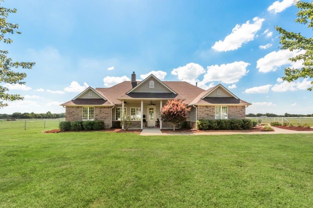 SADDLE UP PARTNER! You will love this 5.5 flat acres of horse paradise. For the horses they will love the 4 indoor stall 3 with outdoor pipe runs and separate stallion stable complete with tack room and tool room. You will love the open floor plan with spacious kitchen complete with 2 year old appliances. This sprawling home has main level master en-suite with soaking jetted tub, large walk in shower and beautiful windows overlooking the pasture where the horses graze. Upstairs is great bonus room or 4th bedroom complete with private bath. Need room for your toys? 40 ft RV barn, 2 loafing sheds, equipment storage, and enclosed 28ft horse trailer parking just to name a few. Neighborhood surrounded by horse trails. Spacious outdoor living perfect for gardening, entertaining and watching the horses run. Enjoy the outdoor cooking area or relax by the firepit or screened in porch. Itās all right here with convenient access to all of NWA.