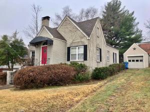Cute home, brick exterior. 2 bedroom, 1 bath home, with one can detached garage and another one car detached with additional workshop area with alley access.