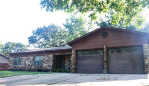Beautiful home in the HEART of Russellville. With three bedrooms, two full bathrooms, an open floor plan, two car garage, and utility room this home is exactly what your family has been looking for! The backyard is fully fenced and offers an extra storage building. Schedule your showing today!