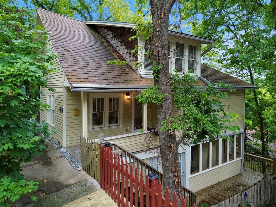 Step back in time while enjoying modern luxury in this beautifully updated 2 bed, 2.5 bath home in Eureka Springs’ Historic District. Built in 1900 and situated on a double, open lot, this three-level home blends timeless character with high-end finishes. Enjoy two new private decks, beautiful wood floors, and stunning tile work throughout. The kitchen impresses with gorgeous granite countertops, a gas range, pot filler, and ice maker. Spa-inspired bathrooms feature walk-in tile showers and a jetted tub. Perfectly positioned just seconds from downtown shopping, dining, and entertainment — a rare opportunity to own a piece of history with modern conveniences in the heart of Eureka Springs.