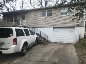 Nice 3 BR, 1 BA, 1,056 Sqft, with a one car garage, hardwood floors, fenced yard, CH&Air, full unfinished basement, large trees, newer roof (2017), and workshop area in basement. Come take a look today.