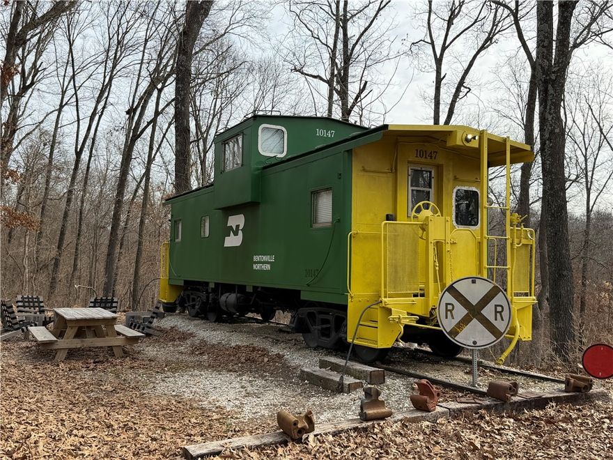 Imagine owning this unique property. It is out of town enough to be somewhat secluded but close enough to enjoy the outdoors and run into town for restaurants or other activities. Close to many of the NWA Bike Trails
