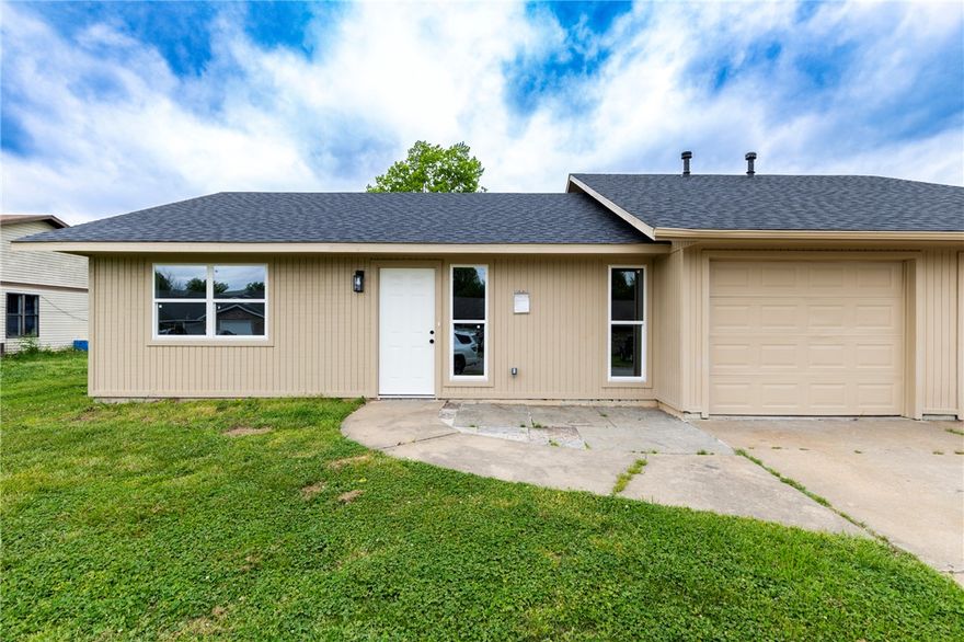 Completely remodeled Duplex in Rogers. Just minutes from I-49, shopping and restaurants. Beautiful wood style flooring throughout. Completely new kitchen, bright white cabinets, stainless appliances and granite counters. Bed rooms feature large closets with plenty of storage. Covered patio area. Large yard with lawn care included.