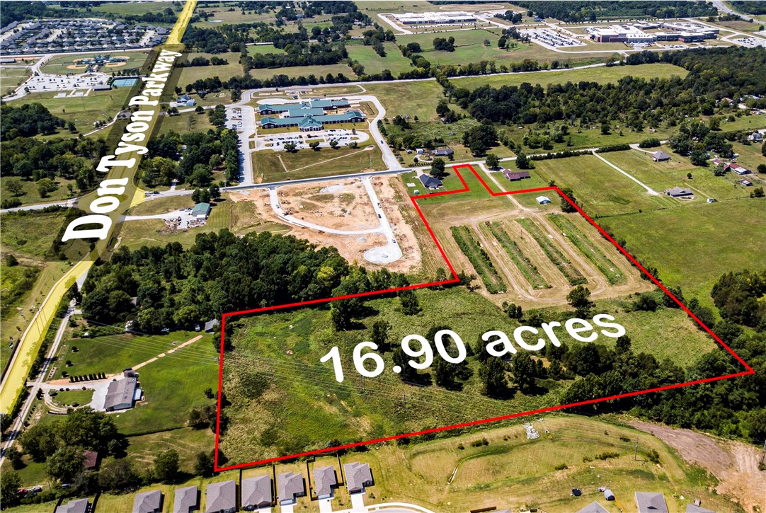 Discover the perfect opportunity with this expansive 16.9-acre lot in the heart of Springdale. Situated in a prime location, this versatile property offers endless possibilities, whether you're looking to build your dream home, develop a new community, or invest in a thriving area. With easy access to major highways, local amenities, and the vibrant culture of Northwest Arkansas, this lot is a rare chance to own a substantial piece of land in one of the fastest-growing areas in the region!