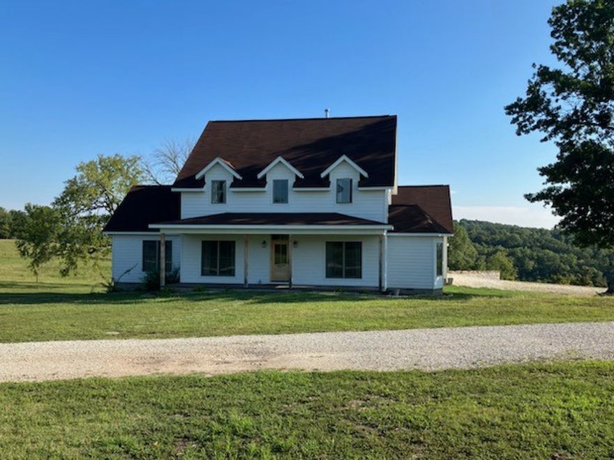 Beautiful Country 2400 sq. ft.  2 story farmhouse on 14 acres with approximately 4 acres of woods - approximately 10 acres of pasture (fenced and cross fenced) small sheep shed, 30x30  metal building with concrete floor, beautiful hardwood pine floors - Corian kitchen countertops, 2 living rooms, loft area, Anderson Wood Windows, Smart Side engineered wood on the exterior cozy wood stove, beautiful views of rolling pasture land and distant views - Sidney creek flows along the property. All year creek.