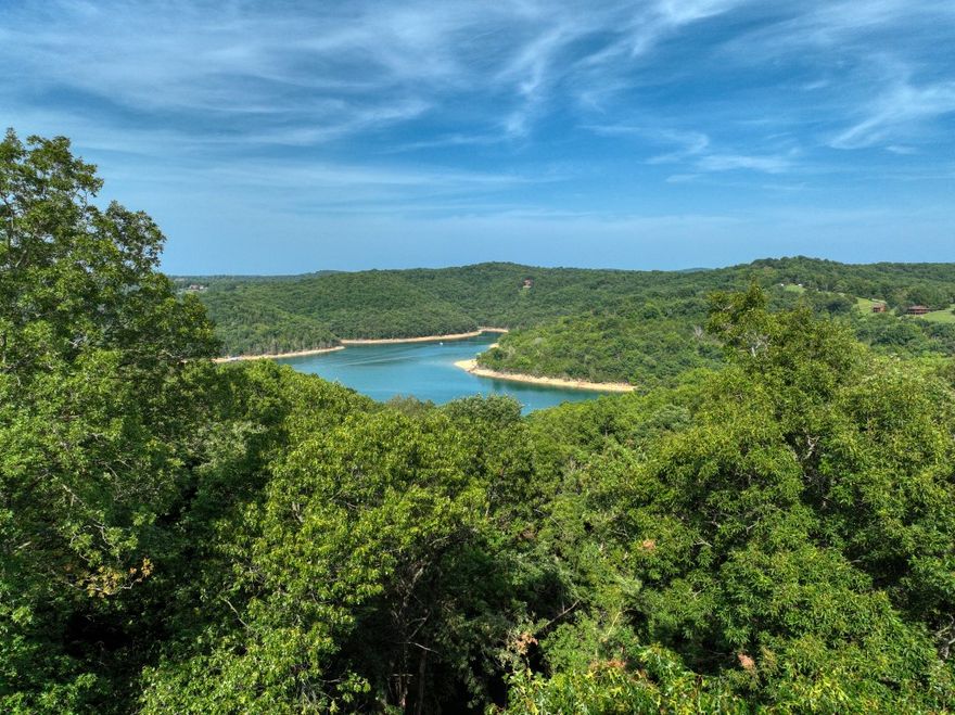 This great Beaver Lake view lot is ready for your build! The lot has been cleared, septic tank installed, and community water is available in this subdivision! Paved road access and a location very close to Starkey Marina make this neighborhood a great choice. Beaver Dam and the White River are 10 minutes away and Eureka Springs is only a short 15 minute drive!