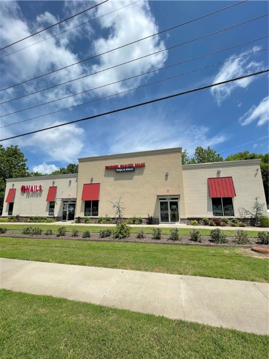 Investment opportunity.  5,000 sf building on 1.33 Acres.  Located on MLK between Fayetteville and Farmington.   Nail salon pays $1700 monthly, 2nd tenant pays $4000 monthly.  Building only 5 years old, no problems, immediate rental income.  Tenants would like to stay.  Call list agent with any questions.