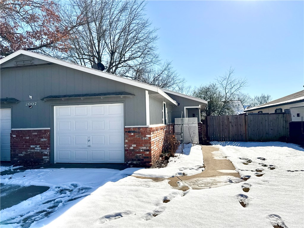 Each unit is 3 bed, 1 bath townhome that has been a great rental. The garage was converted into a 3rd bedroom and a storage area. Located just 3 minutes from Johnson Square, 6 minutes to NWA Mall, and 8 minutes from Downtown Springdale, this turnkey property offers the perfect blend of convenience and potential. This property is situated only minutes from I49, is near shopping, restaurants, and all major amenities. All units have same layout and interior pictures are of unit 2007 B. Property is sold as-is and more units available for purchase.