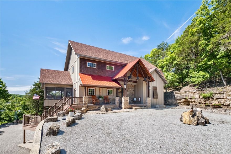 Leisure lake life awaits you! Beautiful, one owner, custom-built home, with fully furnished 
option, nestled in the rock hillside overlooking Table Rock Lake on 6.8 secluded wooded acres. This low maintenance, energy strategy designed home is totally craftsman built featuring wood beams, vaulted ceilings and much more. Main level open floor plan includes living room, dining area open to spacious decks, kitchen with leathered granite countertops, large island, custom knotty alder cabinets, dual ovens and walk-in pantry. Main level primary suite has gorgeous lake view, walk in closet with built-ins, jacuzzi tub and large travertine shower. Upper level includes 2 bedrooms, full bath and huge storage areas/workout room which could easily be converted into a fifth bedroom. The walk out lower level includes a bedroom, full bath, media room, wet bar, safe room with access to 3 car garage. Purchase options include boat slip, pristine Bennington Tritoon and lift. See Virtual Tour and Home Features List. No Rentals.