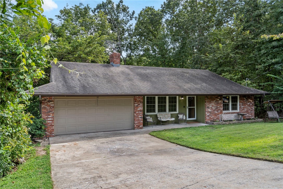 Spacious 4BR + Bonus Room in Bella Vista! This 2,600+ sq. ft. home offers flexibility with a bonus room ideal for a 5th bedroom, office, or guest suite. Features include 2 fireplaces, 2 living areas, a screened-in covered patio, an additional patios overlooking a large, private lot. Enjoy a 2-car garage and plenty of storage. Just 5 minutes to Walmart and a short walk to the Tunnel Vision bike trail, this home is perfect as a primary residence, vacation getaway, or income-producing rental. Residents enjoy Bella Vista POA amenities including championship golf, lakes, pools, tennis, and miles of trails.