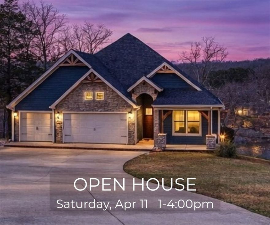 Now offered at $997,000—this Lake Windsor waterfront home with panoramic views and flexible multi-level living is newly positioned to align with today’s buyers. Set on a 0.62-acre lot with ~80 ft of lake frontage, this 3BR, 3BA home offers 3,694 sqft across two levels. The main level features vaulted wood-beamed ceilings, expansive lake-facing windows, and an open-concept great room ideal for entertaining. The primary suite offers lake views, a custom tiled walk-in shower, and a walk-in closet with direct laundry access. A second bedroom and full bath are also on the main level. The walk-out lower level includes a second living area, full kitchen, third bedroom, full bath, and flexible bonus space. Covered outdoor living plus additional lower-level storage for lake gear. Built in 2019 with tile flooring throughout and a 3-car garage. Enjoy lake living with easy access to Bentonville.