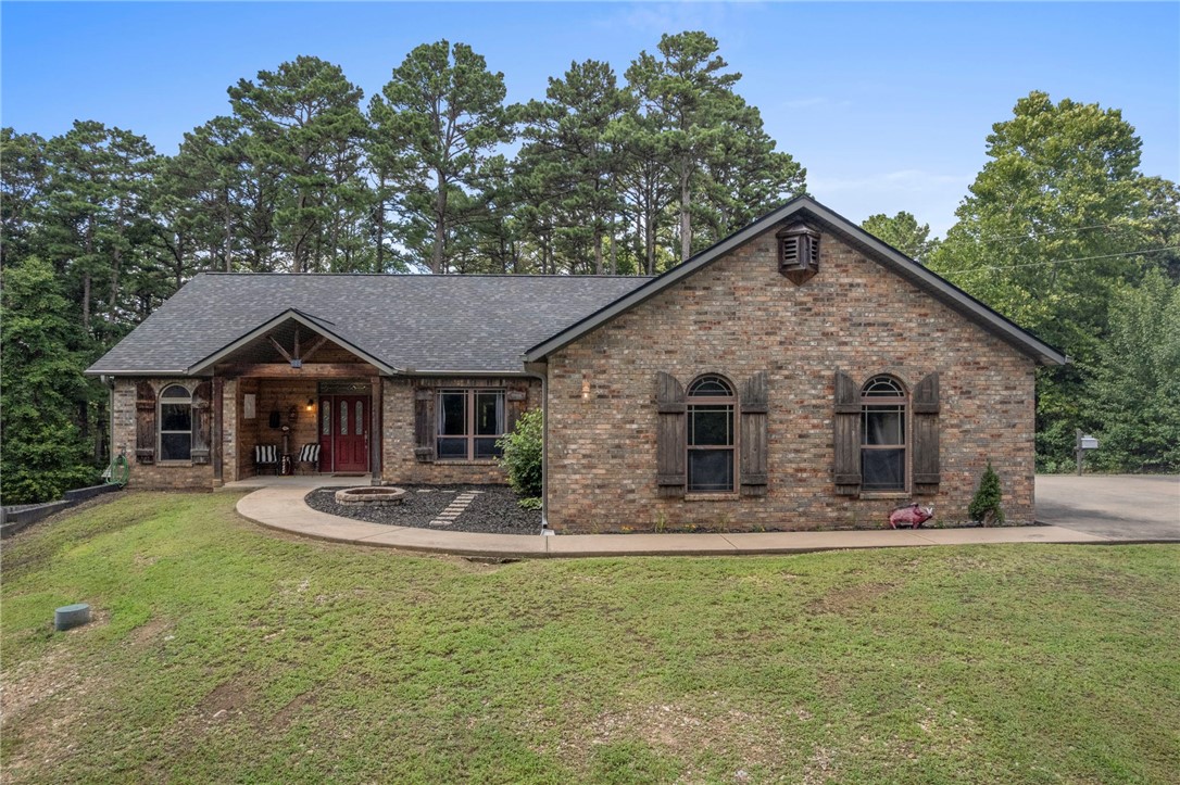 Welcome to 1 Blyton Lane, tucked away on a quiet and secluded street. This home sits on 0.61 acres and offers privacy while still being a 4-minute drive to Highway 71. Convenience and privacyā¦the perfect match. Enjoy peaceful views from the oversized back deck. Your kitchen dining window overlooks the Bella Vista woods. Inside, the semi-open floor plan has a welcoming flow, a spacious living area, a formal dining room (perfect for an office or flex space), and a large laundry room with its own sink. The finished basement includes a full bathroom and offers endless possibilitiesāas an Airbnb, in-law suite, office, gym, or private guest retreat. The oversized garage provides ample room for storage, hobbies, or storage. The roof was replaced in 2021 for added peace of mind. If you're looking for a quiet retreat with flexible living space and room to grow, this home checks every box.