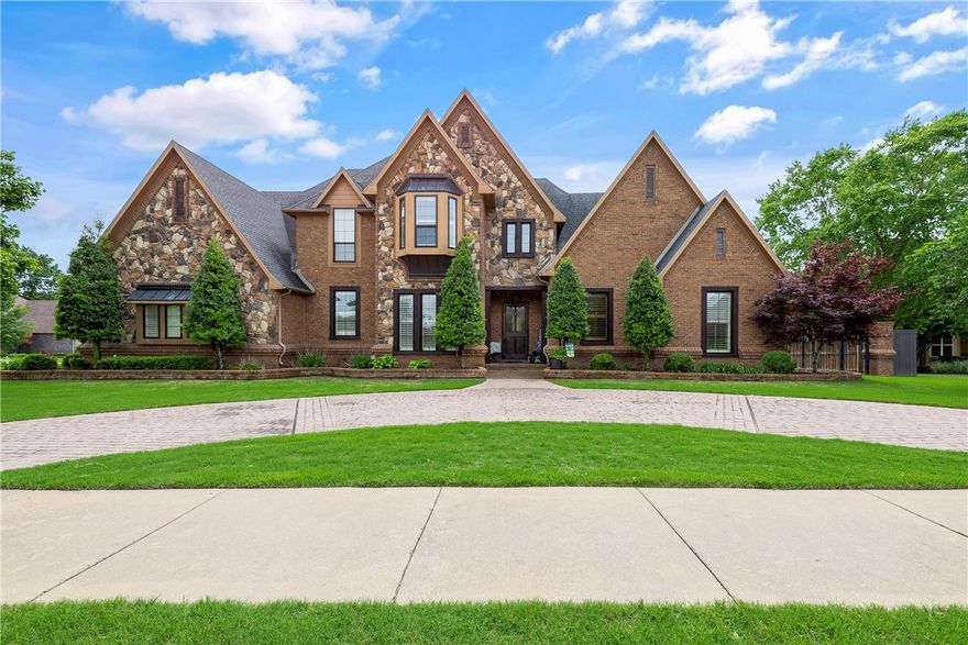 This 4 bedroom house sits on a corner lot with a circle driveway. Walk in the home to 20ft ceilings and new hardwood floors. Plantation shutters, new paint, and carpet throughout. Crown molding adorns every room. New water heater. Remodeled gourmet kitchen with granite countertops, new oven, cooktop, backsplash, dishwasher and sink. Livingroom with wood burning fireplace and formal office to the right and formal dining room to the left. The main bedroom and secondary bedroom are downstairs, while the upstairs hosts 2 bedrooms, bathrooms, and media room. Large hearth room for entertaining. Step outside to a covered patio and pergola while enjoying cookouts. Minutes from the Botanical Gardens and Lake Fayetteville which has a 5 mile walking trail. 15 minutes from I-49, Tyson, and JB Hunt. ADU or In-law quarters. Potential income. Great schools. Harp Elementary, JO Kelly Middle School, George Junior High, Springdale High School.