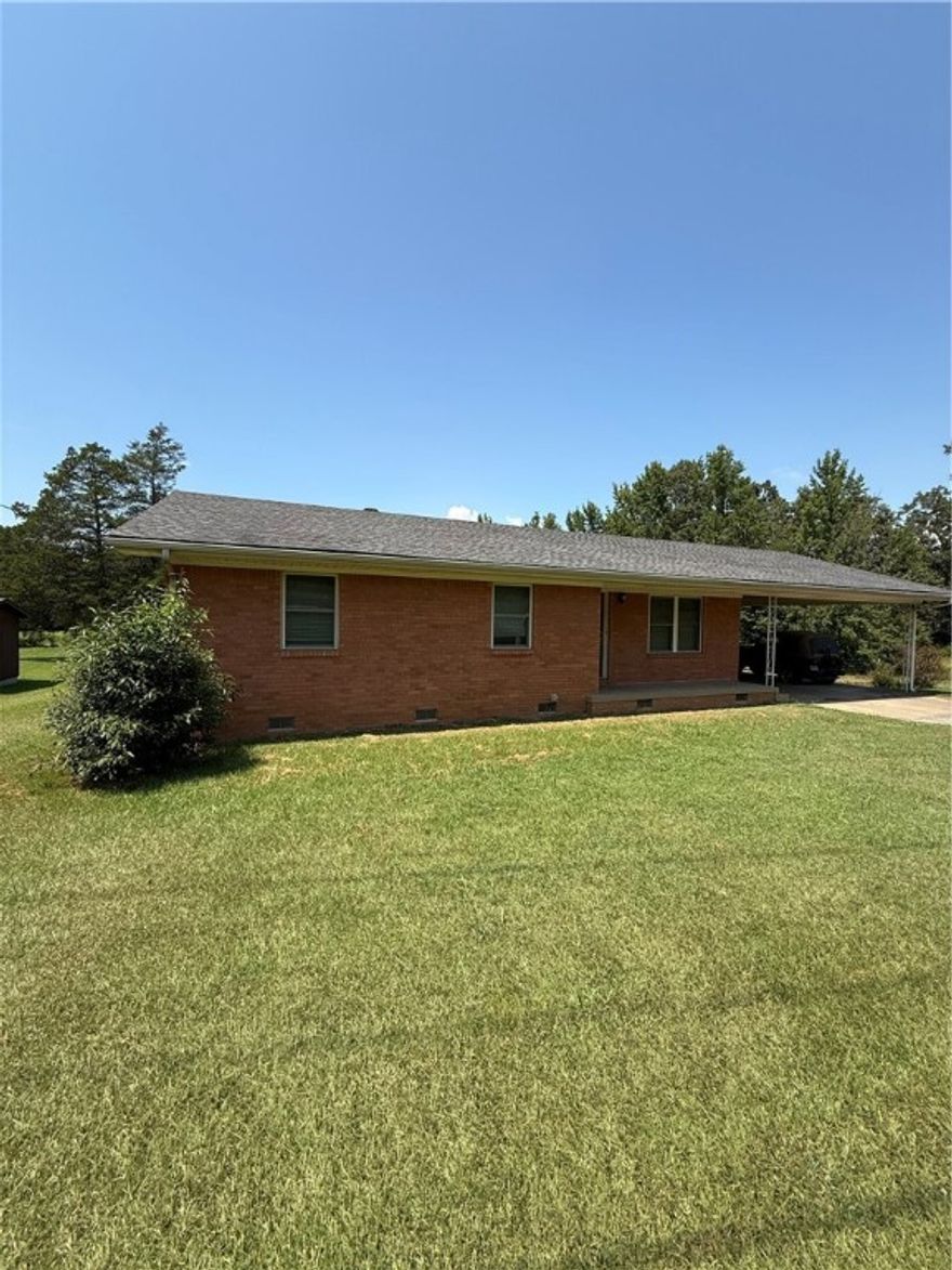 This appealing three bedroom brick abode is set on a generous plot of more than an acre, conveniently located on the outskirts of Russellville. It highlights elegant wood floors, a well designed open kitchen, and a roomy utility space. At the back, there's a patio where you can relax and enjoy your morning coffee or enjoy an evening barbecue.  Book a showing on this property before someone else snatches it up!!
