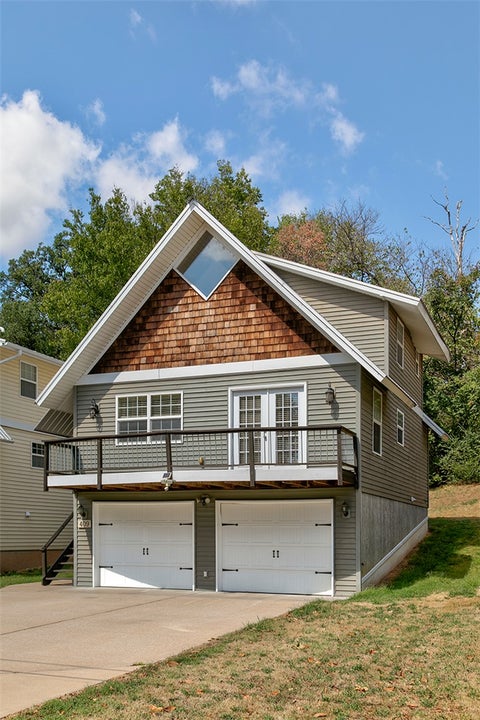Photo of 409 W Tahlequah Street, Siloam Springs, AR 72761 (MLS # 1363012)