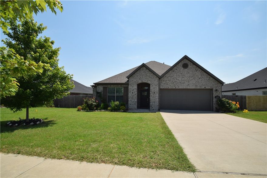 Welcome to the highly sought-after Cornerstone Subdivision! This fantastic 3-bedroom, 2-bath home features wood floors, quartz countertops, stainless steel appliances, and a gas range. The kitchen includes a convenient pantry and vented hood.  The open living space combined with a split bedroom floor plan provides comfort and privacy. Step outside to a large, private fenced backyard with storage shed. The new Walmart Home Office and downtown Bentonville are only 5.5 miles away, and you're close to the Bentonville Community Center and 35-acre Creekside Park. Also Enjoy Cornerstone's subdivision amenities: a clubhouse, pool, playground, and trail system with exercise stations. Pets are negotiable with owner approval and an additional deposit, no smoking, and a one-year lease is required.