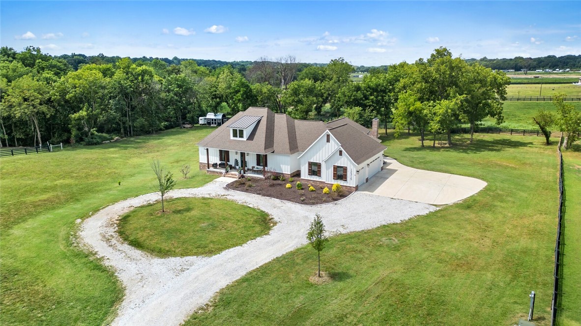 Welcome to the Fairmont Road community where the perfect combination of country charm and modern convenience collide! Welcome to the beautiful 4-bedroom, 3-bath home on 3 private acres mol. The home offers natural light throughout, chef kitchen, energy efficient windows, tankless/instant hot water heater, open floor plan, ready to entertain your family/friends for all your events. A short commute to Bentonville, Siloam Springs, Springdale and XNA airport this property offers spacious living, a gourmet kitchen, and a luxurious primary suite, pantry is also a safe room. Available as a turn-key package with furnishings and hot tub up for further negotiation(s),ājust bring your clothes and move right in!
