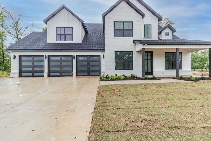 Full photo album at: https://realestatephotonwa.pixieset.com/203autumnhills/ Beautiful new construction in Bentonville premier subdivision Autumn Hills. Soaring 20' ceilings in entry to Living Room. Kitchen features white oak cabinets, expansive waterfall quartz island, commercial style fridge-freezer unit with trim kit. Luxury master suite with private covered patio space. Main level also features a study, second bedroom, mud/utility room, and half bath.  Solid wood floors downstairs. Upstairs three more bedrooms, two full bathrooms, and spacious bonus. 3 car garage, sprinkler system, tankless water heater, covered patio, wired for sound, and includes a house fire suppression system ($12k value!). Floor plan in last two photos.