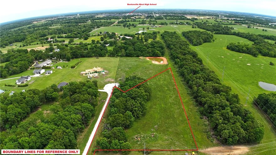 4.14-acre lot, ready for building your dream home! Mature trees line the back side & a section near the road for seclusion, yet the lot is open, and easy to begin construction quickly. This platted-out subdivision is close to I49 and Bentonville, Bella Vista, and Centerton areas-only 16 minutes to the Walmart Home Office, 9 minutes to Bentonville West High School, and 15 minutes to XNA. Bentonville Schools! This property is truly centrally located to anywhere in Benton County. Covenants include no mobiles. Electric and Centerton Water are available at the street, septic is required. Perc test available. Starlink Internet is available, too!