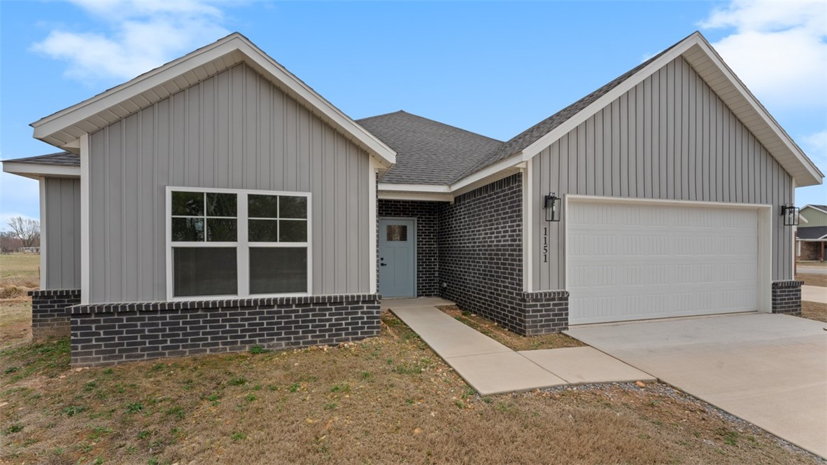Welcome to Phillip's Park! Beautiful quality new craftsman style home in the center of it all in Gentry; close to Gentry Schools , city Park and Gentry Splash Pad. Home features 3 bedrooms, 2 baths, full wood cabinets, pantry, granite countertops, open floor plan, large island, linear gas fireplace, large utility room and covered porch. Complete with vinyl siding, brick and double pane windows for energy efficiency and curb appeal.