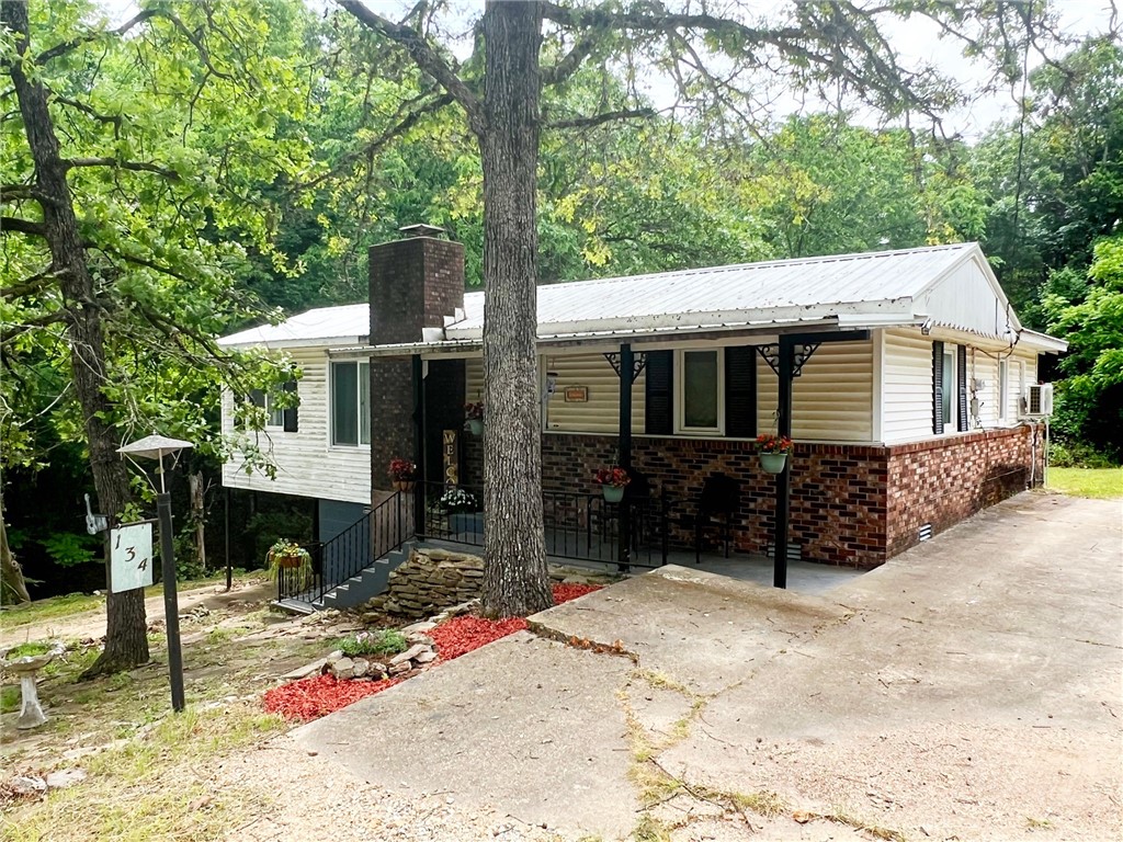 Just in time for lake season! This 3 BR 1 BA lake community cottage has fresh surfaces throughout! Fresh paint, fresh flooring, updated electrical and plumbing, new appliances, 3 new mini-splits...new new new...Sitting on 5 lots totaling .89 of an acre with a large detached garage, this one is a must see.