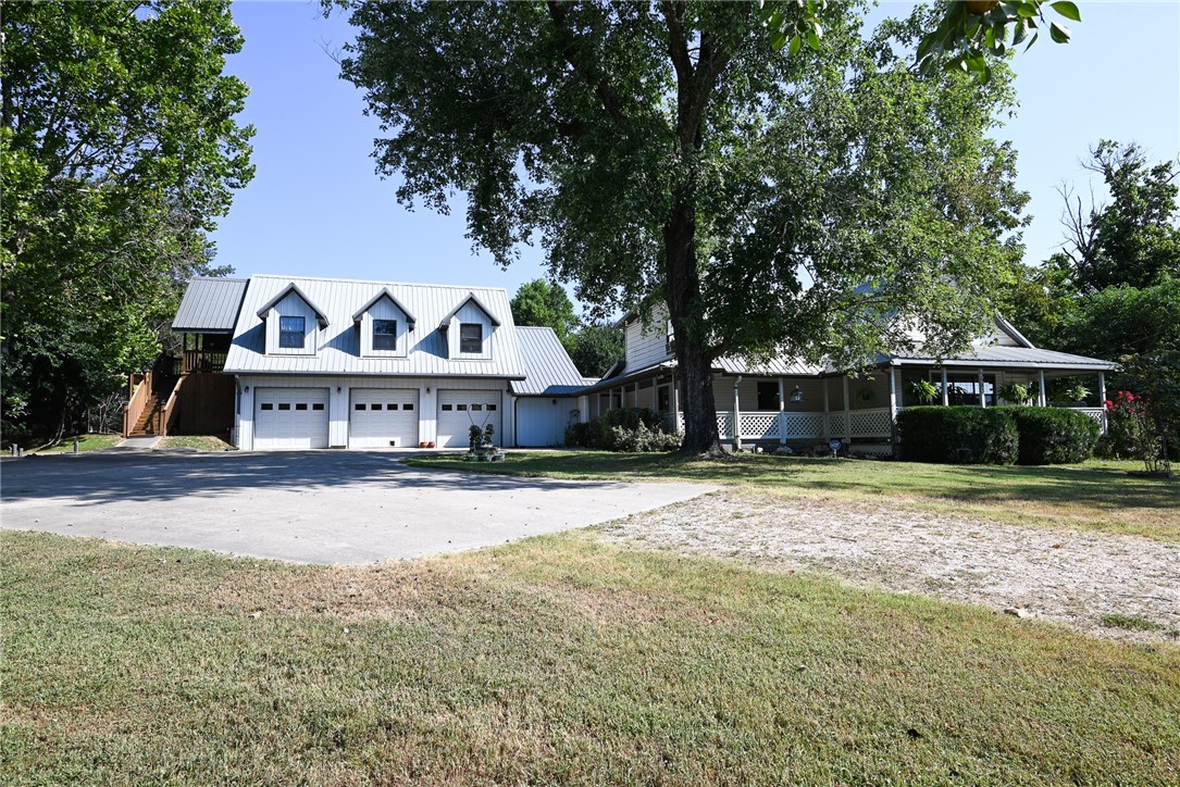 Welcome Home to this 5-bedroom, 4-bathroom estate, situated on approximately 2 acres. It offers the best of country living with the convenience of being just a short distance from town. Step inside to a thoughtful layout with two primary bedrooms, each with an en-suite bathroom. The home also has two separate locations for washer and dryer hookups. The exterior is an entertainer's paradise with a fantastic patio and a covered front porch. The property boasts an abundance of fruit trees. Car enthusiasts will love the huge 3-car garage, which is heated, makes it perfect for a year-round workspace. This home offers comfort, space, and a unique connection to nature.
Disclaimer: All numbers, square footage, and information provided are deemed reliable but should be verified independently by the buyer.