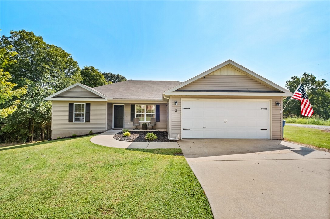 Adorable home on a spacious corner lot in a quiet cul-de-sac. Split bedrooms with the primary room that has brand new carpet and a walk in closet is off the kitchen. Bathroom features a whirlpool bathtub and a shower. The other 2 rooms are of good size, with one having a double closet. Enjoy the crisp nights coming up out on the deck with a large, flat backyard. Jump right outside your front door to experience the world class trail system of 50+ miles! AC unit was replaced in April of 2021, new water heater July 2023, new dishwasher as of May 2023 and Septic pumped in October of 2022. Bentonville Schools. Don't miss out, schedule your showing today!