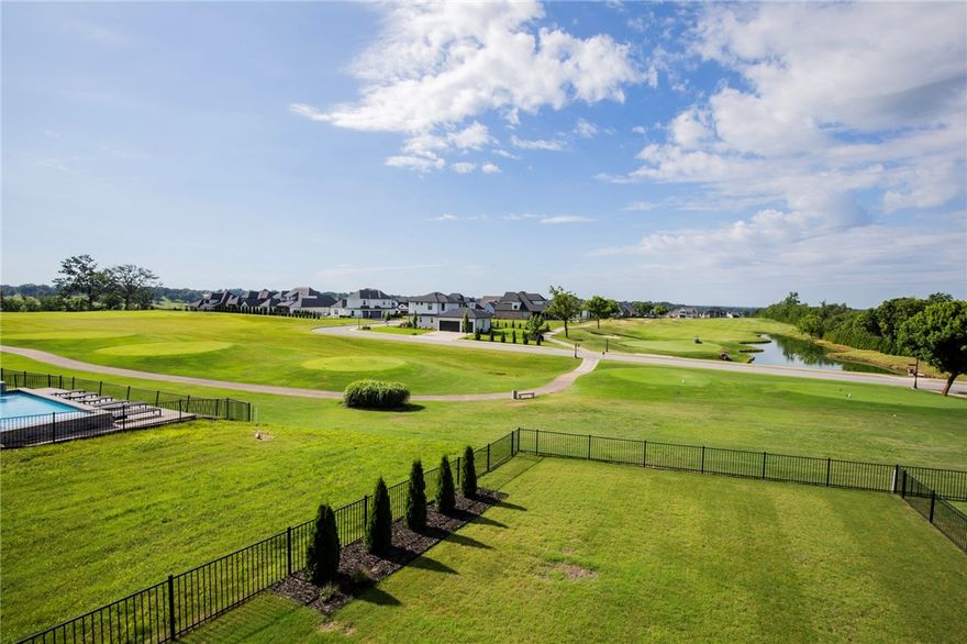 Welcome to your dream home in the coveted Shadow Valley Golf Community, perfectly positioned on the 15th tee with sweeping views of the 14th green. This one-owner 4-bedroom, 2.5-bath home is loaded with thoughtful upgrades. Inside, enjoy a dedicated office with built-ins, a spacious mudroom, and an oversized laundry with added custom cabinetry. The kitchen features an induction cooktop, built-in oven and microwave, large island, and walk-in pantry. The open layout flows to two expansive decks overlooking the course. The primary suite offers a spa-like bath with bidet and hardwired nightstand lamps. Outdoor living shines with a full kitchen and gas fire pit. The epoxy-coated garage provides space for golf carts or hobbies. All within one of Northwest Arkansas’s premier gated communities offering golf, pool, tennis, pickleball, clubhouse dining, and more.   Welcome Home
