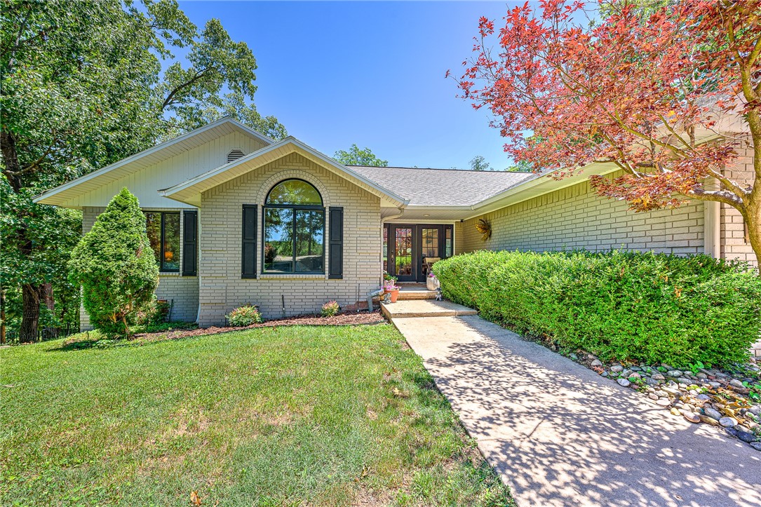 Check out this Sought after home in the established Bentonville subdivision, Hidden Springs! This 6 bedroom/4.5 bathroom home has plenty of space to entertain and is move in ready! It is just minutes from Crystal Bridges, Downtown Bentonville, Amazeum, dog parks and walking/biking trails, and close to so much NWA has to offer! This custom home has had several recent updates including New roof, built ins, updated kitchen, open living and dining area updates, new bar/game room space downstairs, newer decking, new dog run, new or refinished floors in several rooms, and ready for you to add your own personal touches! The home also has additional upgrades such as the finished downstairs in 2018, bathrooms and laundry on both levels, geo thermal system, built-ins, heated bathroom floors downstairs bathroom, new lighting/windows in several areas, and above ground pool. Enjoy this large home for fun summer entertaining and hanging out on the deck or in the pool! Seller offering $5k towards buyer’s closing costs or choice!
