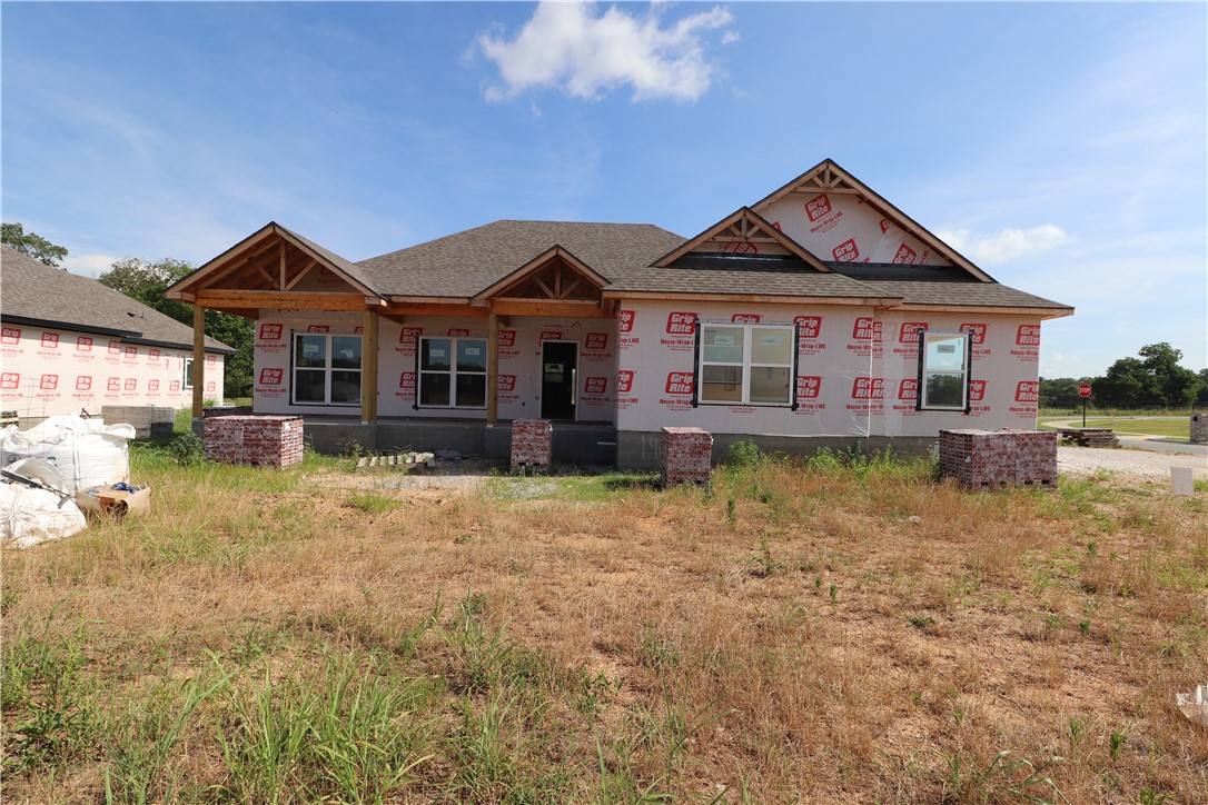 Extremely well built 1,698+/- Sq ft new construction 3 bed, 2 bath, 2 car oversized garage. This home offers tall ceilings and open concept living room and kitchen, split bedroom floor plan, access to laundry from master bedroom closest, covered front and back patios.
