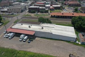 Ideally located in the center of Russellville's historic downtown. This property provides several opportunities for business owners or investors. Sitting on nearly two city blocks with frontage along two of Russellville's major thoroughfares and within walking distance to all of the areas favorites restaurants, shops, and art and entertainment districts.