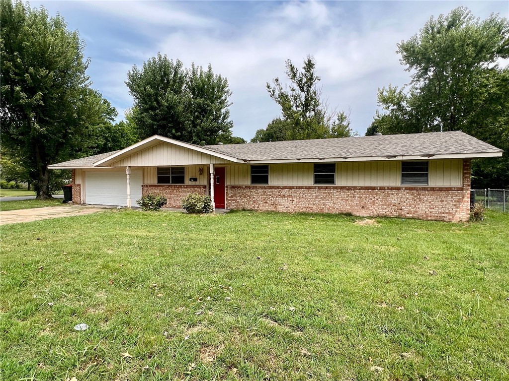 Nice home in Springdale on a corner lot. Homes features 3 bedrooms, 2 full bathrooms, 2 living spaces, one with gas log fireplace other with new LVP, new carpet in bedrooms, and fenced in yard. Homes comes with in law studio apartment on backside of house.