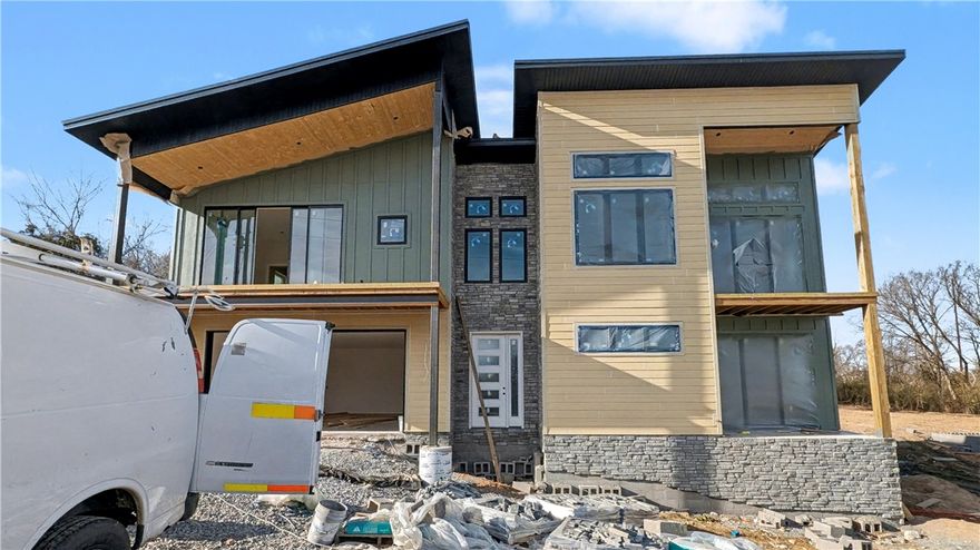 Welcome To Your Next Home! Bored Of Beige Boxes? Good, Because This Stunner Didn’t Come To Play—It Came To Slay. This Architectural Masterpiece Serves Up Serious Mountain Modern Energy With Sharp Angles, Mixed Textures, And Serious Curb Appeal. Step Inside And Look Up At The Soaring, Light-Wood Tongue-And-Groove Vaulted Ceilings That Bring Warmth And Drama To An Open-Concept Living Space Anchored By A Massive Floor-To-Ceiling Stone Fireplace Begging For A Glass Of Wine And A Cozy Playlist. And All Those Windows! The Kitchen Is Designed For The Host With The Most, Featuring A Sprawling Island And Custom Cabinetry That Adds Tons Of Flavor. The Bathrooms Are Total Showstoppers With Moody Black Honeycomb Tile, Sleek Vertical Stacked Showers, Tile Walls, And Design Choices That Feel Like A Boutique Hotel, While The Custom Mudroom Ensures Even Your Shoes Have A Stylish Place To Live. With Bold Rooflines, Modern Horizontal Railings, And Striking Stone Accents, This Home Looks As Good From The Street As It Feels Inside.