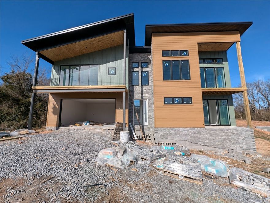 Welcome To Your Next Home! Bored Of Beige Boxes? Good, Because This Stunner Didn’t Come To Play—It Came To Slay. This Architectural Masterpiece Serves Up Serious Mountain Modern Energy With Sharp Angles, Mixed Textures, And Serious Curb Appeal. Step Inside And Look Up At The Soaring, Light-Wood Tongue-And-Groove Vaulted Ceilings That Bring Warmth And Drama To An Open-Concept Living Space Anchored By A Massive Floor-To-Ceiling Stone Fireplace Begging For A Glass Of Wine And A Cozy Playlist. And All Those Windows! The Kitchen Is Designed For The Host With The Most, Featuring A Sprawling Island And Custom Cabinetry That Adds Tons Of Flavor. The Bathrooms Are Total Showstoppers With Moody Black Honeycomb Tile, Sleek Vertical Stacked Showers, Tile Walls, And Design Choices That Feel Like A Boutique Hotel, While The Custom Mudroom Ensures Even Your Shoes Have A Stylish Place To Live. With Bold Rooflines, Modern Horizontal Railings, And Striking Stone Accents, This Home Looks As Good From The Street As It Feels Inside.
