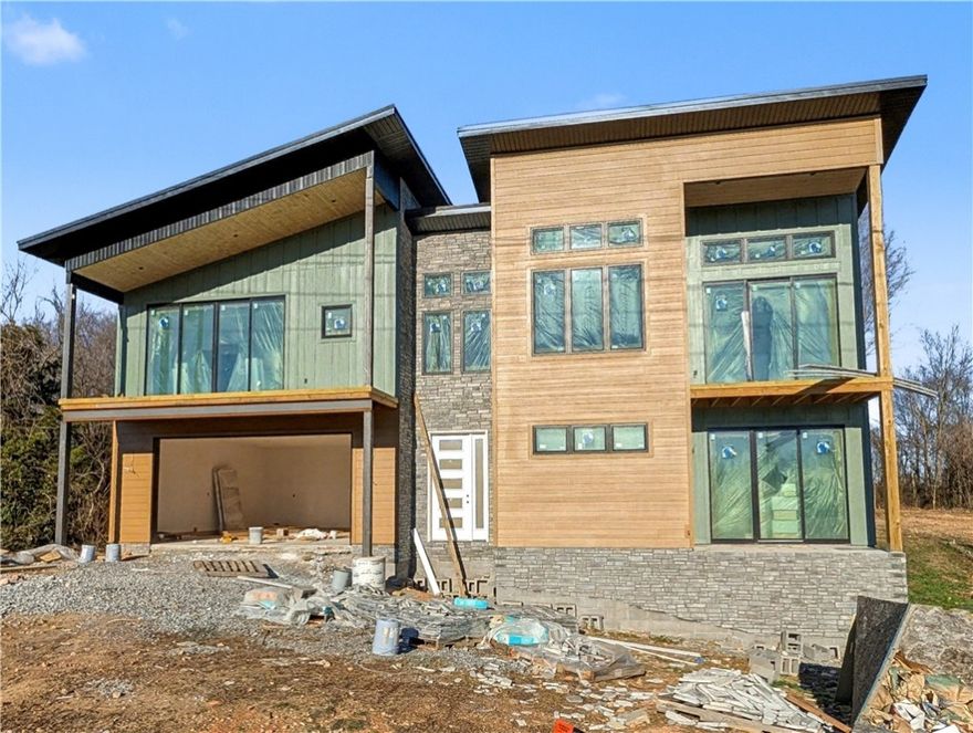 Welcome To Your Next Home! Bored Of Beige Boxes? Good, Because This Stunner Didn’t Come To Play—It Came To Slay. This Architectural Masterpiece Serves Up Serious Mountain Modern Energy With Sharp Angles, Mixed Textures, And Serious Curb Appeal. Step Inside And Look Up At The Soaring, Light-Wood Tongue-And-Groove Vaulted Ceilings That Bring Warmth And Drama To An Open-Concept Living Space Anchored By A Massive Floor-To-Ceiling Stone Fireplace Begging For A Glass Of Wine And A Cozy Playlist. And All Those Windows! The Kitchen Is Designed For The Host With The Most, Featuring A Sprawling Island And Custom Cabinetry That Adds Tons Of Flavor. The Bathrooms Are Total Showstoppers With Moody Black Honeycomb Tile, Sleek Vertical Stacked Showers, Tile Walls, And Design Choices That Feel Like A Boutique Hotel, While The Custom Mudroom Ensures Even Your Shoes Have A Stylish Place To Live. With Bold Rooflines, Modern Horizontal Railings, And Striking Stone Accents, This Home Looks As Good From The Street As It Feels Inside.