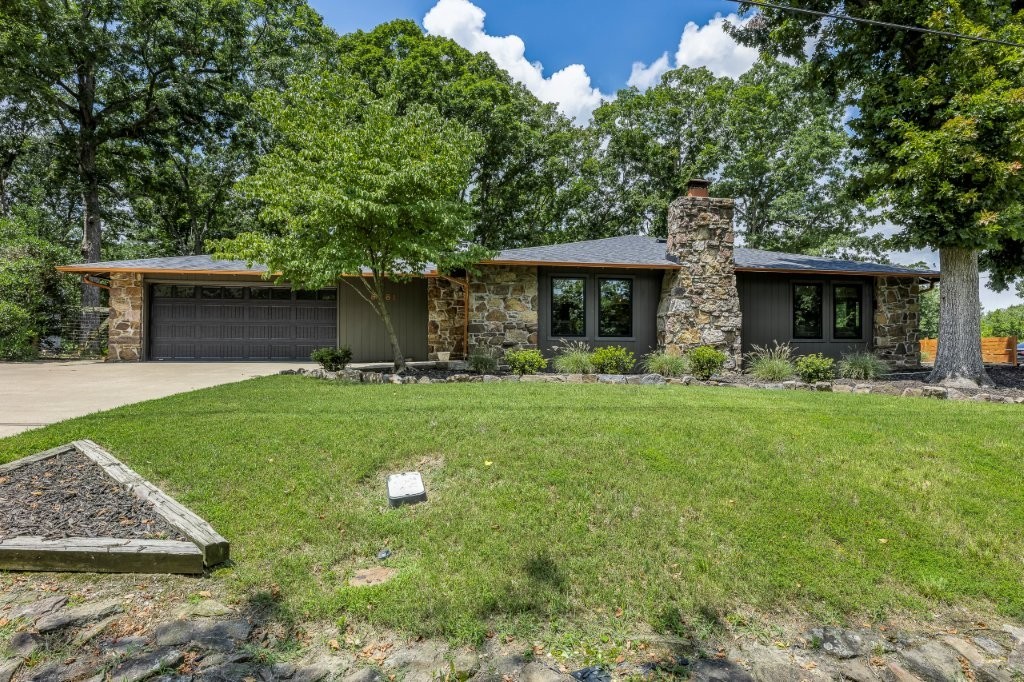 Absolute SHOWSTOPPER!! This Beaver LAKEVIEW 1 level home on a flat .86 acre lot, has been completely remodeled & updated beyond new construction with everything TOP-OF-THE-LINE! Impressive split bedroom plan & open concept living is sure to please your dreamy wish list. Gourmet kitchen open to living area includes: Quartz countertops, HUGE island, NEW soft close cabinets, & all new GE CAFE appliances. Interior has new paint, new doors, new windows, new knobs, new light fixtures all thru-out. Exterior has new roof, gutters, and paint! Enjoy entertaining indoors or outdoors on the new stamped & stained 20x15 patio with views of the lake! Fabulous location: 2 mins to Prairie Creek Marina/boat launch, 2 mins to HWY 12 bridge boat launch, or 5 mins to downtown Rogers. Come LIVE & LOVE the LAKE-LIFE where nature abounds!