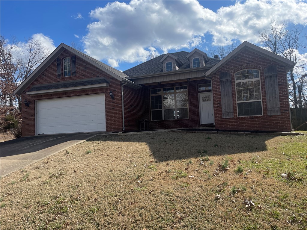 Welcome to 1 Little Drive Entry in Bella Vista, AR 72715, a meticulously remodeled residence. This 2060sqft, 3-bedroom, 2-bath home with an additional office and a 2-car garage was built in 2005 on a spacious double lot, providing .72 acres of pure freedom. The property boasts numerous upgrades, including a new roof (2022), fresh carpet in bedrooms, new laminate flooring and trim, new paint, and updated light fixtures and faucets, washer and dryer. The air conditioning was replaced in 2018. The kitchen comes fully equipped with a refrigerator, cook stove/oven, dishwasher. The master suite is a luxurious retreat featuring a walk-in shower, jacuzzi tub, and his/her walk-in closets. With its modern amenities and stylish finishes, this residence is truly move-in ready, offering a perfect blend of comfort and sophistication. Welcome to a home where every detail reflects a commitment to quality and convenience.