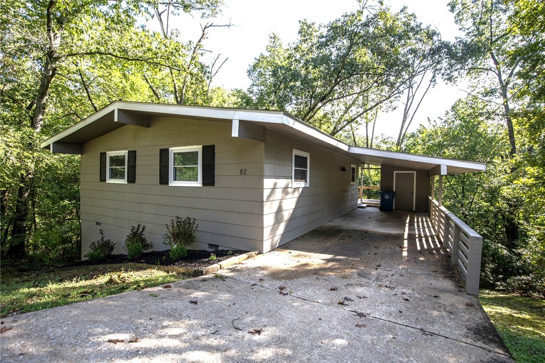 Beautifully remodeled home just minutes from Lake Ann in Bella Vista. This 2 bedroom 2 bath home features quartz counter with white tile back splash, white cabinets, and stainless appliances in the kitchen, wood style flooring throughout. Primary bedroom has large closet and bathroom features oversized walk in shower. Large deck off the living room with amazing view. Back 40 trail is only a mile away. Enjoy all that Bella Vista has to offer.
