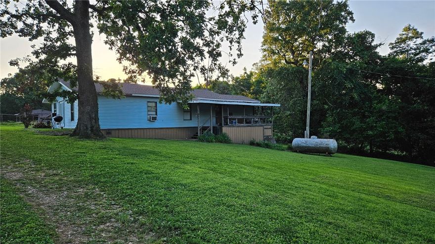 Huge price improvement! Looking for a country property, but not too far away? This beautiful 3-acre property is located within 2 miles of the new Highway 549.  It has a Gravette address but really is just out of Hiwasse limits. Most of the land is fenced with iron fencing and divided into separate paddocks. The 36 x 12 barn is perfect for farm animals or equipment storage.
The home has a newer roof, replaced in January 2020. There are three bedrooms, two bathrooms, and a large living room with a wood-burning stove. The home with some repairs would  make a great rental or a place to live while you're building your dream home.
Property is being sold as-is. The heat and AC are not currently working, so there are a few window units that will convey. Make an appointment to see this one today!