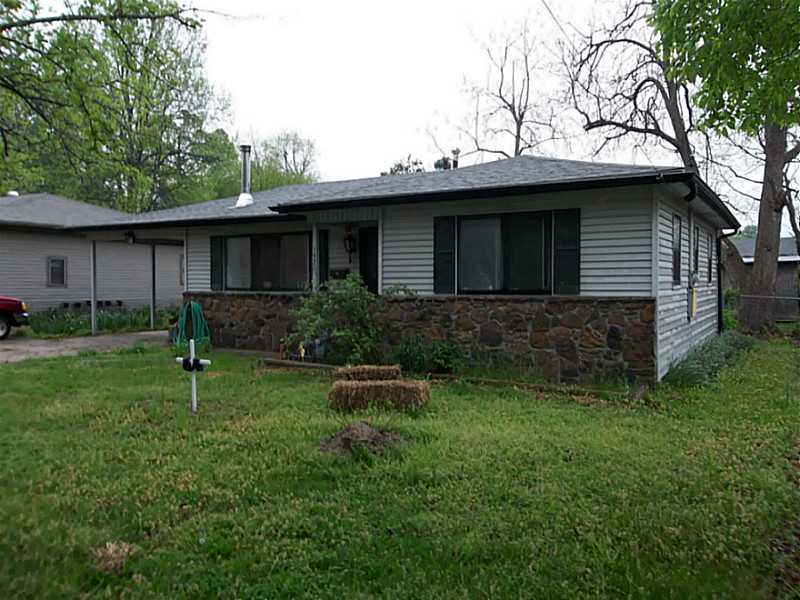 Could be a good investment property or great starter home. Large backyard with small garden area. 32x16 shop storage building. Access backyard from alley. Rock and vinyl siding. Attic fan, covered patio off dining room.