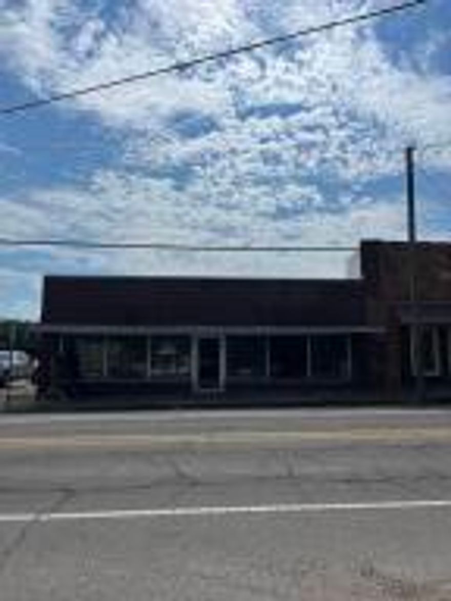 COMMERCIAL BUILDING. Building could be used for any thing basically.  It is know for being a Pharmacy, Salon, Tanning Booth, Gym and Church.  Come take a look and let your imagination run wild.  Roof and 1 of the HVAC are less than 5 years old.