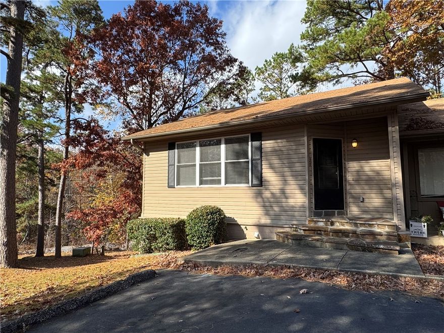 Come check out this beautiful move in ready Town House at Hot Springs Village! If you ever wanted to be a part of this gated community for a great price, this is your opportunity. This spacious and comfortable 3 bedroom, 2 full bath with tubs awaits. It has a spacious kitchen with plenty of cabinets, walking closets, large laundry room and two enclosed porches to enjoy the scenery. Amenities at the Village include, 9 private Golf courses (seven 18-hole golf courses, one 27-hole golf complex and one prestigious, award-winning private club) indoor community pool, tennis courts, pickleball, parks, lakes, trails, boating, fitness center and so much more! Don't wait, this opportunity won't last long! Call for your private appointment today!