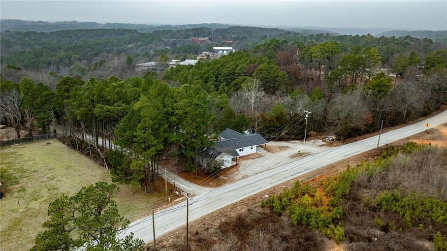 This unique investment opportunity offers city-themed units with room to expand, including the option to buy additional units (MLS # 1305400). Ideal for retreats, weddings, and events, there's potential to enhance outdoor amenities like hot tubs. The property boasts a new metal exterior, a 2023 roof, and mostly new electrical, plumbing, and HVAC systems. Fresh decking, new main water lines, and an outdoor hydrant add value. Ready to capitalize on growing demand for themed accommodations, this is a rare find!